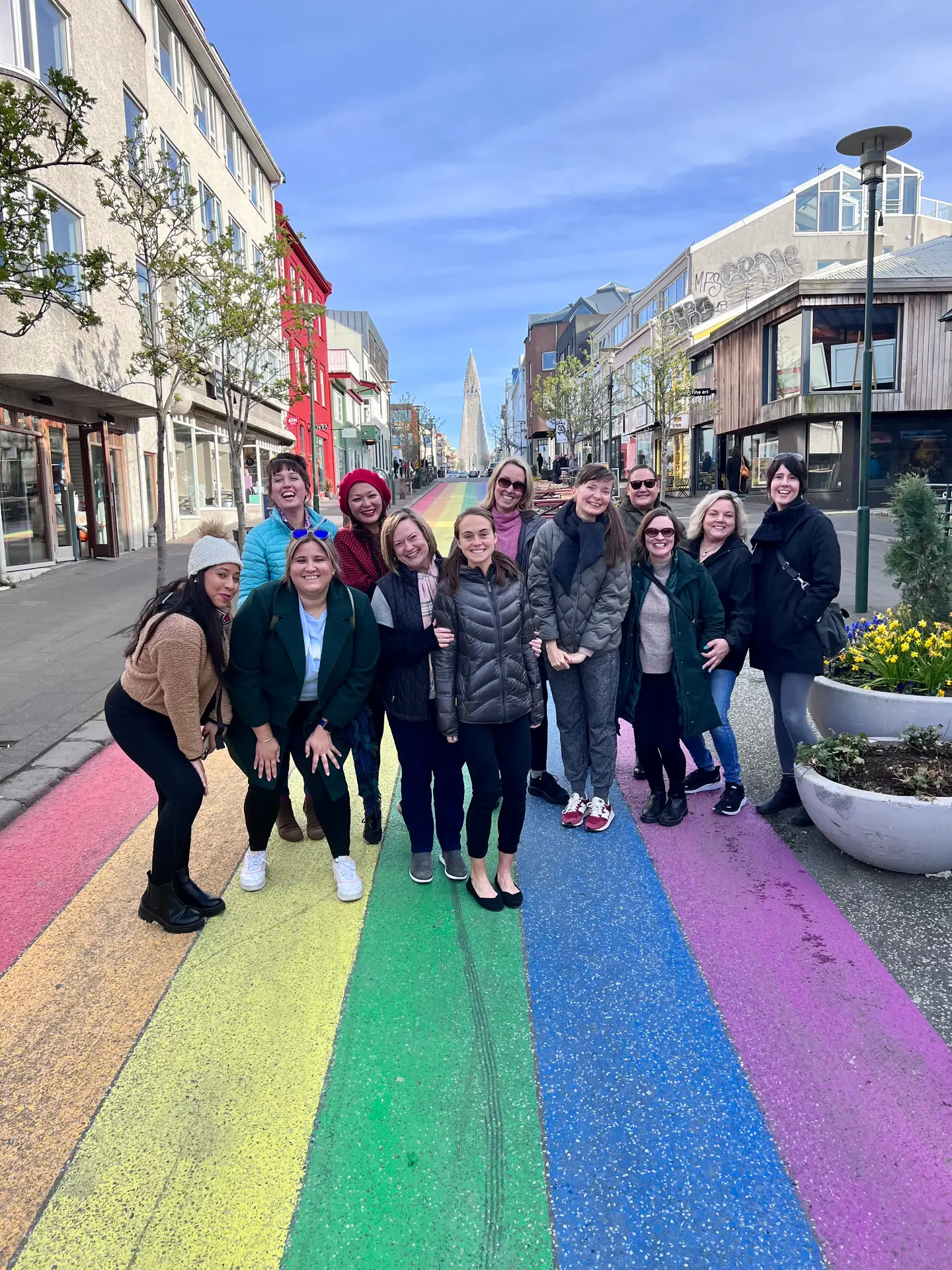 Group of women on the rainbow-painted street in Reykjavík