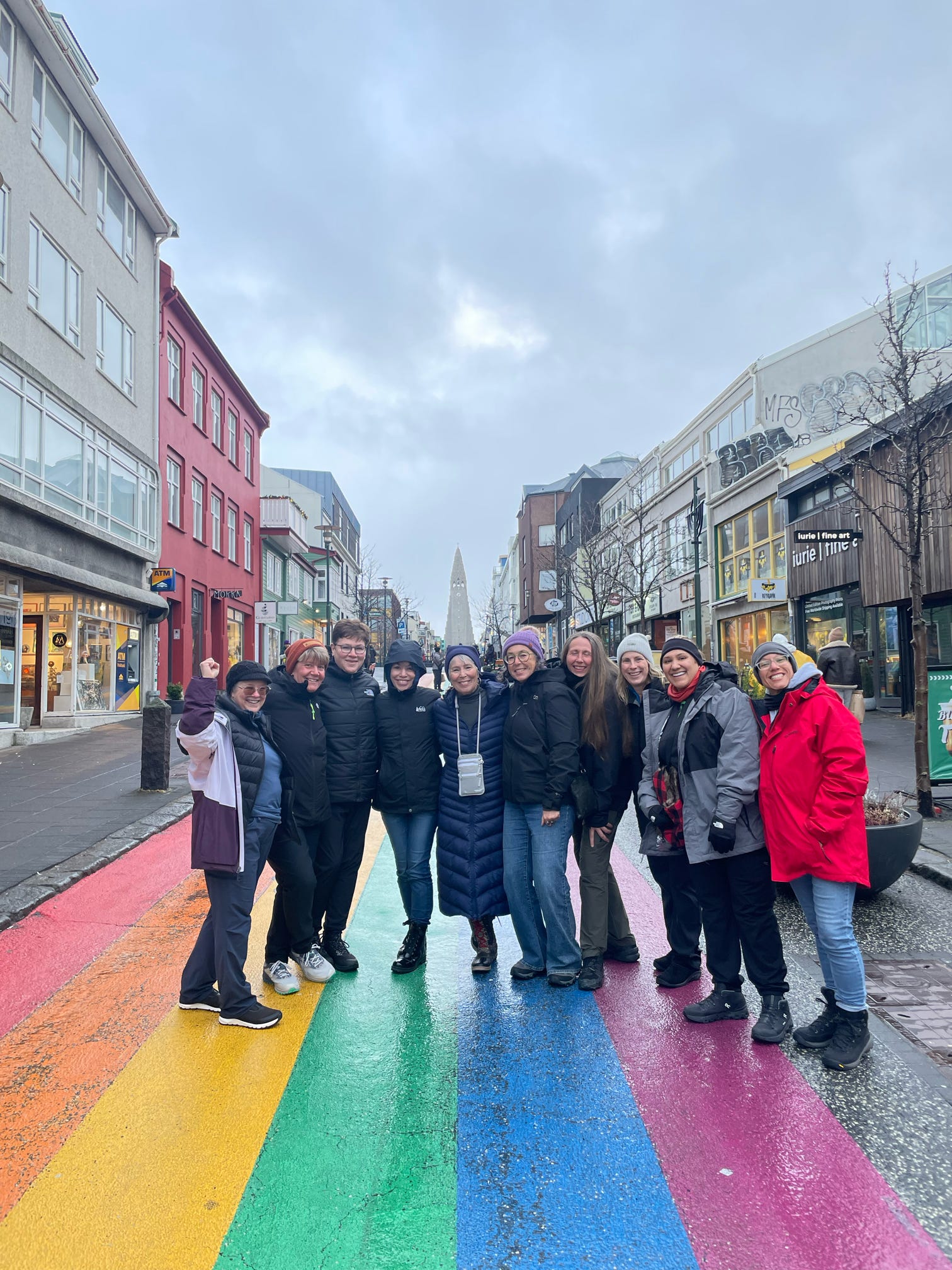 Group of women on a rainbow-painted street