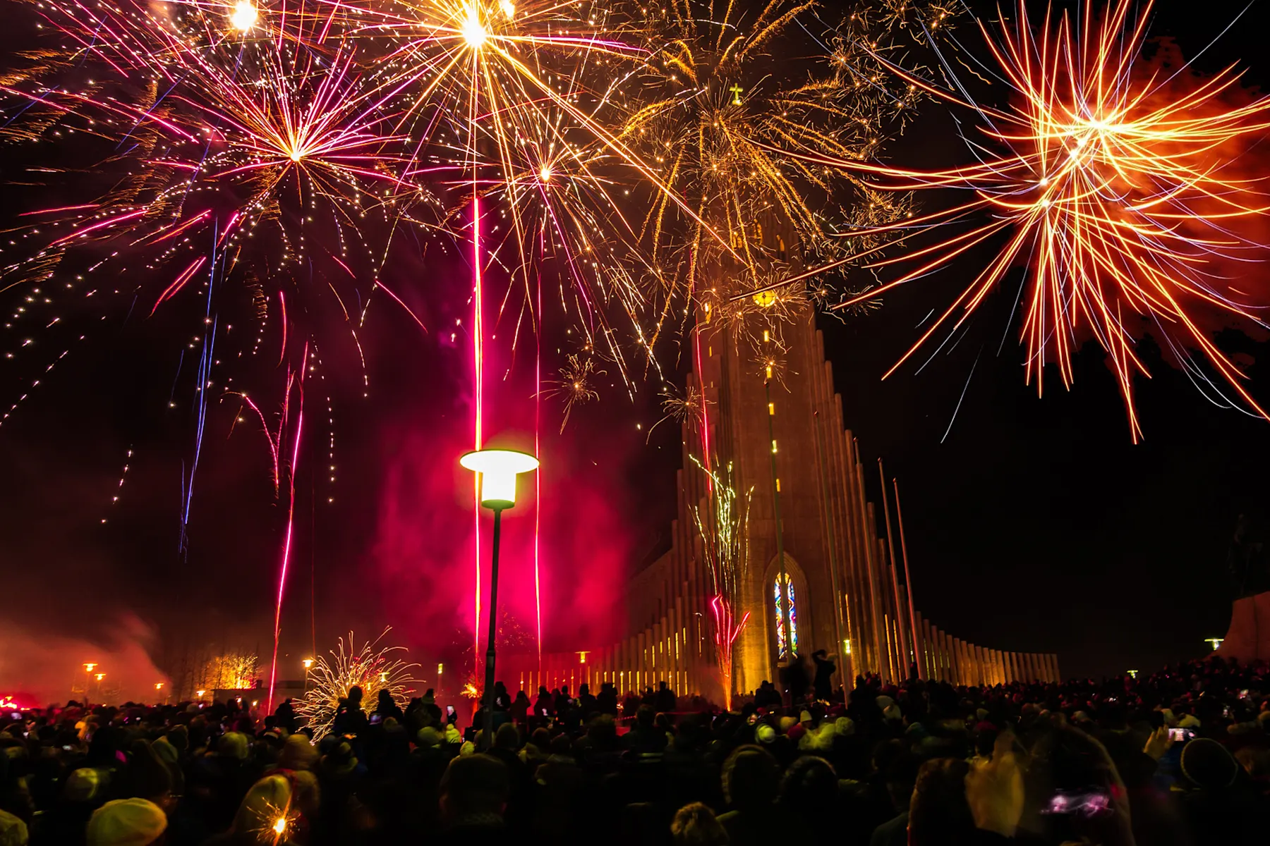 Fireworks over a church on New Year's Eve