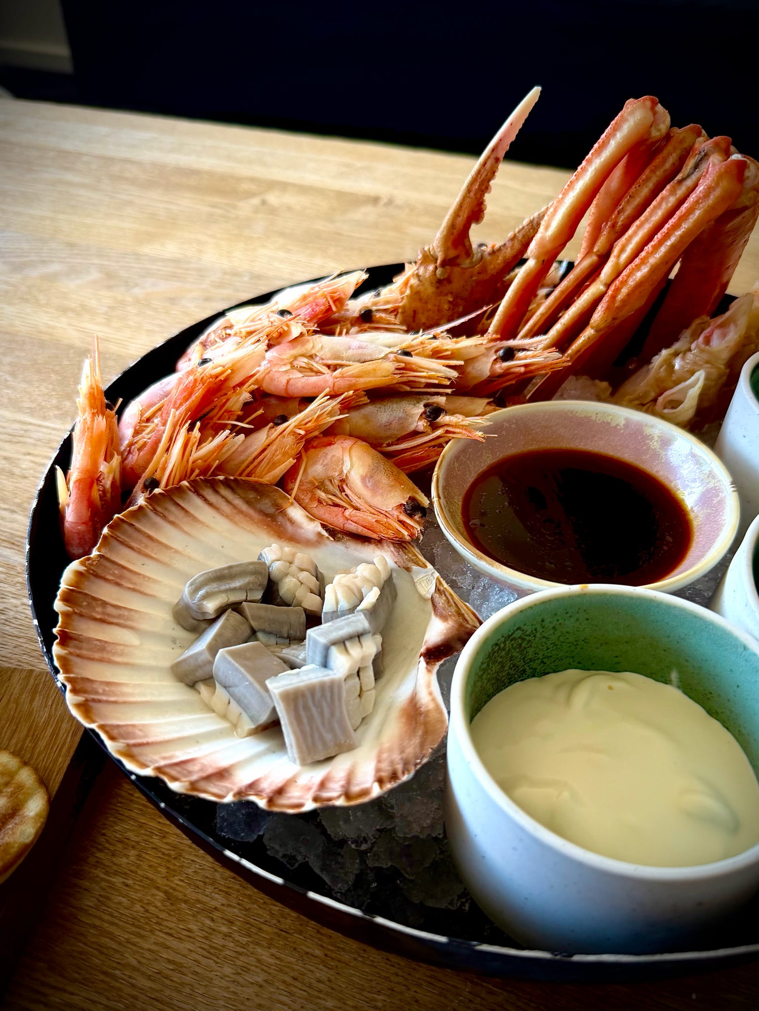 Platter of langoustines and shellfish with dipping sauces