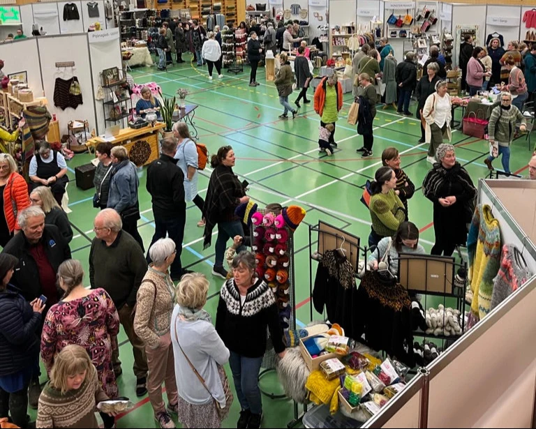 Busy wool market in a sports hall